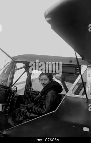 Amy Johnson (Mrs Mollison) in her machine at Stag Lane Aerodrome before flying to Lympne in Kent. Stock Photo