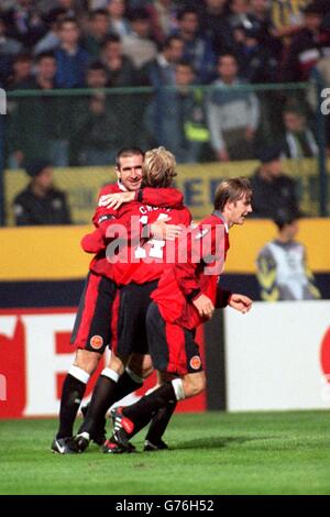 UEFA CHAMPIONS LEAGUE SOCCER - Fenerbahce SK v Manchester United. Manchester United's Eric Cantona celebrates his goal with Jordi Cruyff Stock Photo