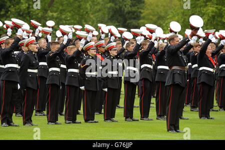 Royal Marine Cadets give three cheers as they were presented with a new colour by the Duke of Edinburgh (not pictured) at a 350th Foundation day parade, in the garden of Buckingham Palace, London. Stock Photo