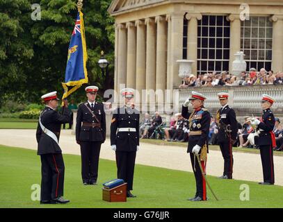 The Duke of Edinburgh (3rd right) presents a new colour to the 500 Royal Marine Cadets, at a 350th Foundation day parade, in the garden of Buckingham Palace, London. Stock Photo