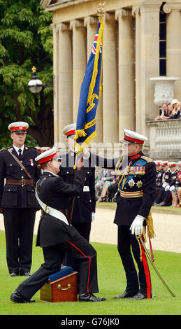 The Duke of Edinburgh (right) presents a new colour to the 500 Royal Marine Cadets, at a 350th Foundation day parade, in the garden of Buckingham Palace, London. Stock Photo