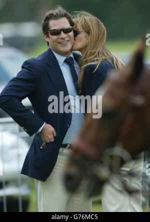 Supermodel Elle Macpherson with her partner, French financier Arpad 'Arki' Busson, at the final of the Veuve Clicquot Polo Gold Cup at Cowdray Park at Midhurst, West Sussex. Stock Photo