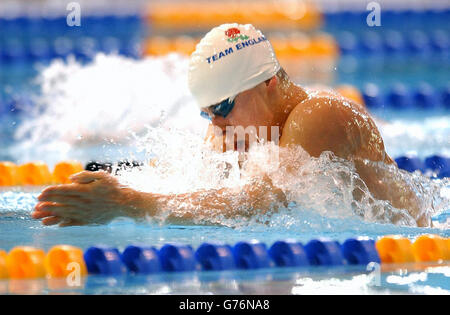 England's Adam Whitehead during the men's 100m breaststroke at the Commonwealth Games at the Manchester Aquatic Centre, Manchester. Stock Photo