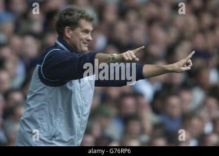 Tottenham Hotspur's manager Glenn Hoddle makes a tactical adjustment during their FA Barclaycard Premiership match at Tottenham's White Hart Lane ground in London. Final score Tottenham Hotspur 3, West Ham United 2. Stock Photo