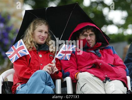 Tennis fans on 'Henman Hill' at Wimbledon wait for play to start after rain delayed the start of all matches. Stock Photo