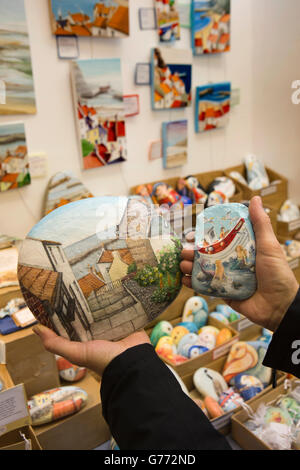 UK, England, Yorkshire, Staithes, Church Street, St Peter’s Church Craft shop, Lucy Wilson’s painted pebbles Stock Photo