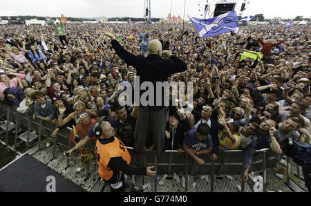 Tim Booth of James performing on the Main Stage at the T in the Park festival, held at Balado Park in Kinross, Scotland. Stock Photo