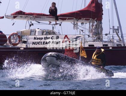 Greenpeace activists demonstrate against the sponsorship of the French America's Cup team by a nuclear power company at the course in the Hauraki Gulf off Auckland, New Zealand. They handed out anti-nuclear leaflets and biscuits with the slogan 'Nuke free NZ'. *...The Areva company has invested 15 million Euros into the team which has yet to win a single race. Stock Photo