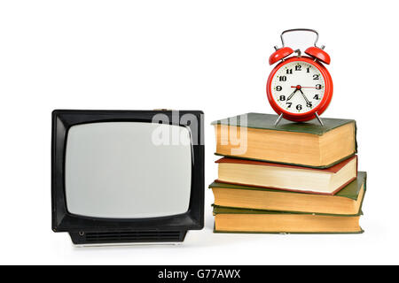 Vintage analog portable TV, some old books and retro alarm clock  isolated on white Stock Photo