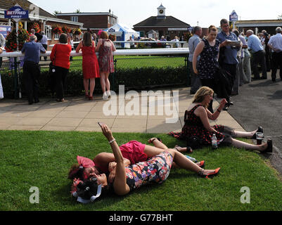 Racegoers Enjoying The Sunshine On Day One Of Royal Ascot At Ascot 