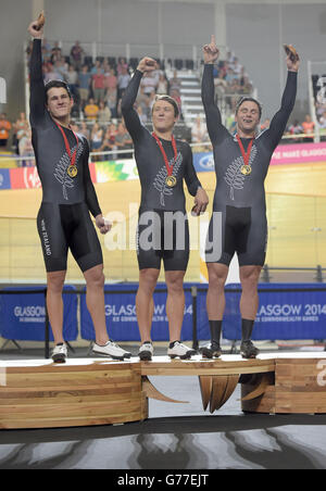 New Zealand's Edward Dawkins, Ethan Mitchell and Sam Webster with their Gold medals in the Team Sprint at the Sir Chris Hoy Velodrome during the 2014 Commonwealth Games in Glasgow. Stock Photo