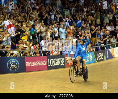 Scotland's Craig Maclean and Neil Fachie celebrate their victory in the Mens Para Sport Sprint Tandem Final at the Sir Chris Hoy Velodrome during the 2014 Commonwealth Games in Glasgow. Stock Photo