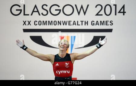 Wales' Michaela Breeze takes bronze in the womens 58kg weightlifting, at the Clyde Auditorium during the 2014 Commonwealth Games in Glasgow. Stock Photo
