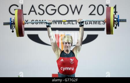 Wales' Michaela Breeze on her way to taking bronze in the womens 58kg weightlifting, at the Clyde Auditorium during the 2014 Commonwealth Games in Glasgow. Stock Photo
