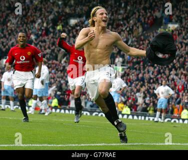 Manchester United's Diego Forlan celebrates scoring the equaliser against Aston Villa during the Barclaycard Premiership match at Old Trafford, Manchester. Manchester United drew 1-1 with Aston Villa. Stock Photo