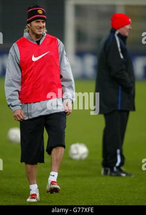 Manchester United's David Beckham (left), with manager Sir Alex Ferguson overlooking training at the Stadio Delle Alpi, Turin, ahead of the Champions League group D match against Juventus in Turin tomorrow. Stock Photo