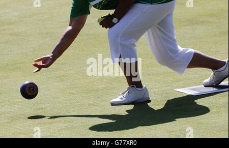 Sport - 2014 Commonwealth Games - Day Two. A competitor at the Kelvingrove Lawn Bowls Centre during the 2014 Commonwealth Games in Glasgow. Stock Photo
