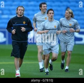 (From left to right) David Beckham, Laurent Blanc, Gary Neville and Diego Forlan, during training in the Bernabeu Stadium, Madrid, before Manchester United's Champions League match against Real Madrid. THIS PICTURE CAN ONLY BE USED WITHIN THE CONTEXT OF AN EDITORIAL FEATURE. NO WEBSITE/INTERNET USE UNLESS SITE IS REGISTERED WITH FOOTBALL ASSOCIATION PREMIER LEAGUE. Stock Photo