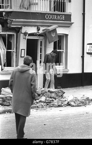 Alan Bristow, acting manager of the Horse and Groom public house in North Street, inspects the bomb damage. Stock Photo