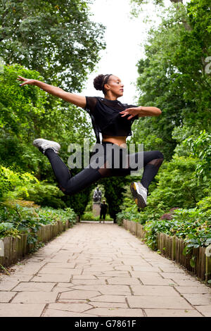 jazz dancer mid air outdoors Stock Photo