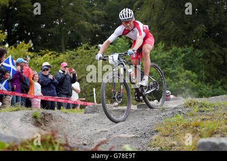 England's Liam Killeen in the Cross-Country Mountain bike race at Cathkin Braes Mountain Bike Trail, during the 2014 Commonwealth Games near Glasgow. Stock Photo