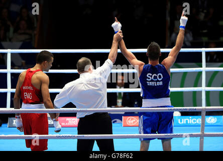 Scotland's Josh Taylor celebrates beating England's Samuel Maxwell in the Men's Boxing Light Welter (64kg) Semi-final 1 at the SECC, during the 2014 Commonwealth Games in Glasgow. Stock Photo