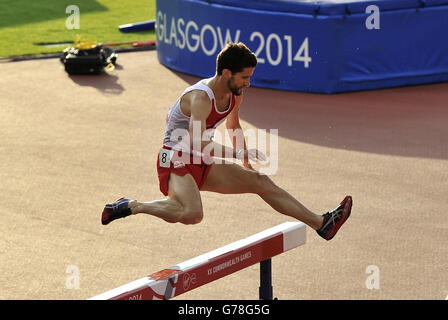 England's Luke Gunn in the Men's 3000m Steeplechase Final, at Hampden Park, during the 2014 Commonwealth Games in Glasgow. Stock Photo