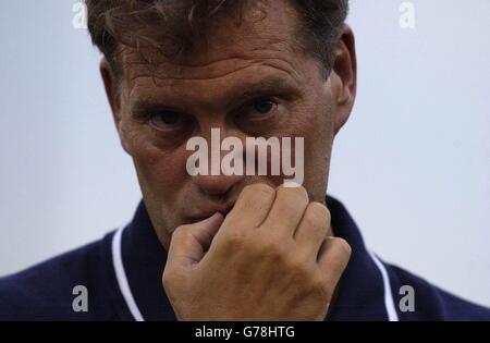 A pensive Glenn Hoddle watches his Spurs side return to action, after a pre-season break in La Manga, during the pre-season friendly between Tottenham Hotspur and Stevenage Borough, at Broadhall Way, Stevenage. 21/9/03: Tottenham Hotspurs have announced that manager Glenn Hoddle has left the club with immediate effect. Former England boss Hoddle has come under increasing pressure at White Hart Lane following the club's disappointing start to the new Barclaycard Premiership season. Stock Photo