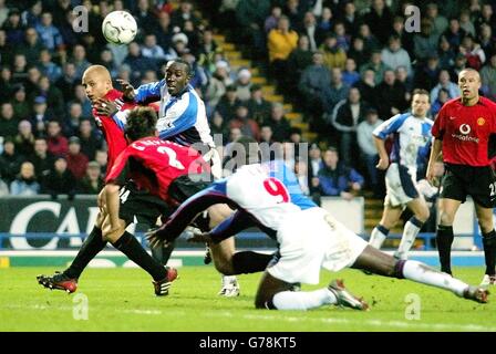 Blackburn Rovers's and former Manchester United strike partners Andy Cole (no.9) and Dwight Yorke (left) both miss from close in the box during their FA Barclaycard Premiership match at Blackburn's Ewood Park. Final score 1-0 to Blackburn. Stock Photo