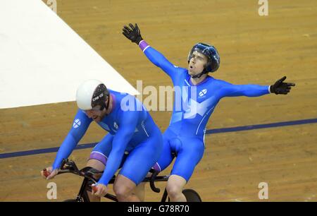 Scotland's Neil Fachie (right) and Craig MacLean celebrate after winning gold in the Men's Para-Sport 1000m Time Trial B Tandem Final at the Sir Chris Hoy Velodrome during the 2014 Commonwealth Games in Glasgow. Stock Photo