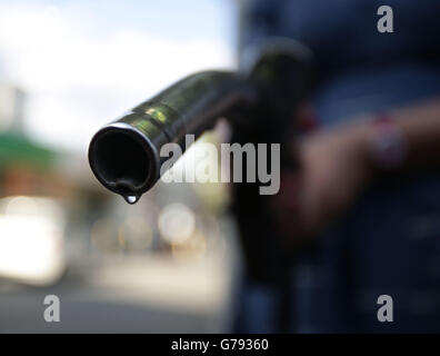 Petrol Pump Station GVs. A car being filled up with a pump at a petrol station in London. Stock Photo