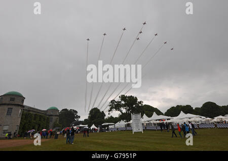 Red Arrows arrive over Goodwood Festival of Speed in bad weather Stock Photo