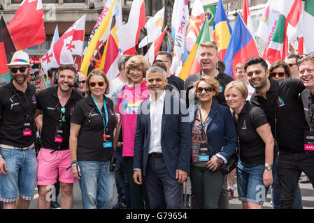 London, UK, 25 June 2016. Central London. London Mayor Sadiq Khan leading the Pride Parade - Posing for the camera with his wife Saadiya Khan. Credit: pmgimaging/Alamy Live News Stock Photo