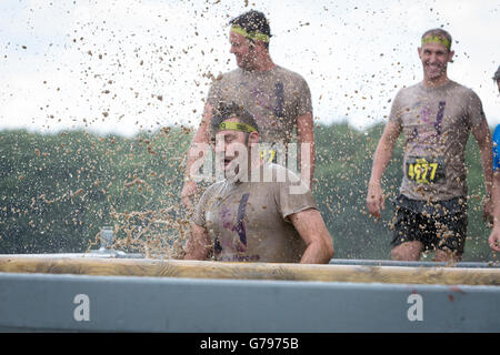 Leeds, UK. 25th June, 2016. Man taking The Plunge into an ice bath at the Total Warrior Event at Bramham Park, Leeds on 25th June 2016 Credit:  John Hopkins/Alamy Live News Stock Photo