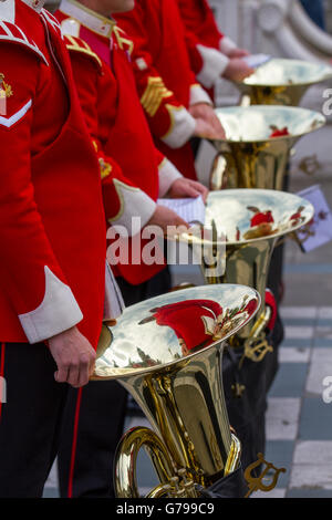 Uniformed Tuba players ensemble in Southport, Merseyside, UK. June, 2016. Armed Forces Day as British army soldiers in the Band of The King's Division. Musicians, tubas, bass instruments, concert bands, brass bands and military bandsmen based in Preston, Lancashire take the salute as the members play God Save the Queen to applause from the gathered veterans and onlookers. Stock Photo