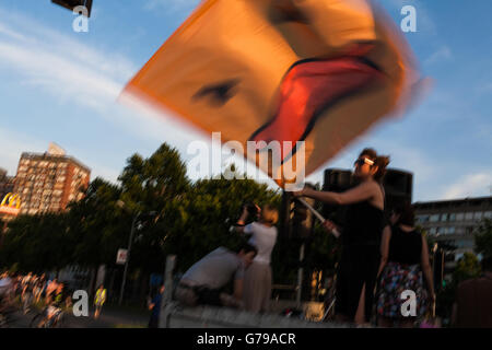 Belgrade, Serbia. 25th June, 2016. Waving yellow duck flag at demonstrations in Belgrade. Yellow duck is symbol of the movement. Milos Bojovic/Alamy Live News Stock Photo