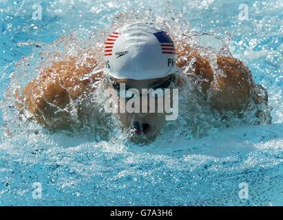 USA's Michael Phelps competes in the Men's 200m Butterfly heat at the Olympic Aquatic Centre in Athens, Greece. 09/11/04: The six-time Olympic swimming gold medalist Michael Phelps has been charged with drunken driving in Maryland after running a stop sign in his 4X4 vehicle, police said. Stock Photo