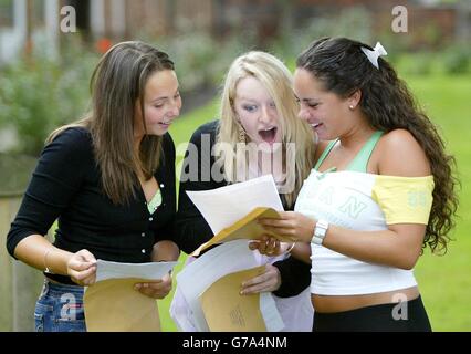 A-Level students (left to right) Melissa Williams (4 A grades), Georgia Ellis and Kate Antrobus (4 A grades) celebrate getting their results at Withington girls school, Manchester. Stock Photo