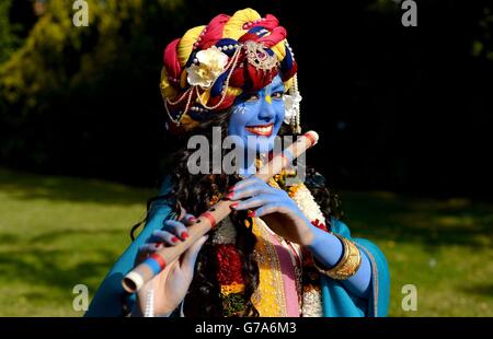 Laxmipriya Patel, 21, from Watford dressed as Lord Krishna at the Bhaktivedanta Manor Hare Krishna Temple in Watford during the Janmashtami Festival. Stock Photo