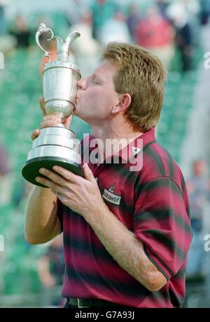 Nick Price kisses the cup. Stock Photo