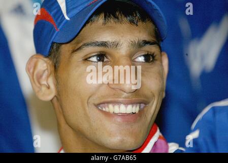 Boxing silver medalist Amir Khan speaks at a news conference at Gatwick Airport, after teamGB arrived home from the Athens Olympic Games with 9 Gold, 9 Silver and 12 Bronze medals. Stock Photo