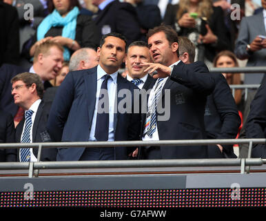 Manchester City chairman Khaldoon al Mubarak (left) and chief executive Ferran Soriano in the stands during the Community Shield match at Wembley Stadium, London. Stock Photo