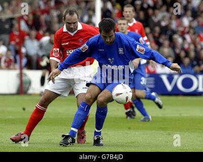 Rotherham's Darren Garner (L) challenges Ipswich's Drissa Diallo during their Coca-Cola Championship match at Millmoor, Rotherham. . Stock Photo