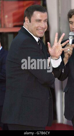 AP, AFP OUT. Star of the fim John Travolta arrives for the premiere of 'A Love Song For Bobby Long' at Mostra Internazionale d'Arte Cinematografica Lido in Venice, Italy during the 61st annual Venice Film Festival. Stock Photo