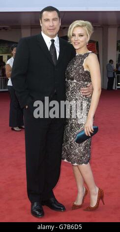 AP, AFP OUT. Stars of the fim John Travolta and Scarlett Johansson arrive for the premiere of 'A Love Song For Bobby Long' at Mostra Internazionale d'Arte Cinematografica Lido in Venice, Italy during the 61st annual Venice Film Festival. Stock Photo