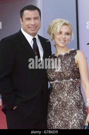 AP, AFP OUT. Stars of the fim John Travolta and Scarlett Johansson arrive for the premiere of 'A Love Song For Bobby Long' at Mostra Internazionale d'Arte Cinematografica Lido in Venice, Italy during the 61st annual Venice Film Festival. Stock Photo