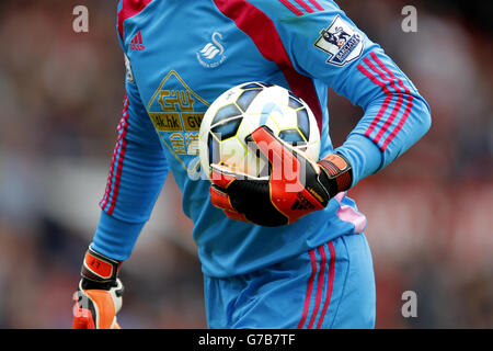 Soccer - Barclays Premier League - Manchester United v Swansea City - Old Trafford. Closeup detail of Goalkeeper Lukasz Fabianski holding the ball. Stock Photo