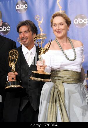 Actors Al Pacino, left, and Meryl Streep with their Emmys at the for the 56th Annual Emmy Awards in Los Angeles, California. Pacino and Streep both won for lead actors in a miniseries or movie for their roles in 'Angels in America.' Stock Photo