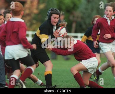 Rugby Union ... Cambridge University v French Barbarians. Young boys and girls get their chance to shine on the pitch in a game of mini rugby at Cambridge Stock Photo