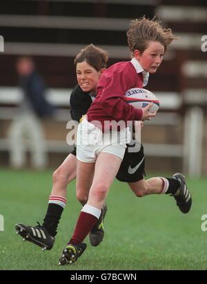 Rugby Union ... Cambridge University v French Barbarians. Young boys and girls get their chance to shine on the pitch in a game of mini rugby at Cambridge Stock Photo